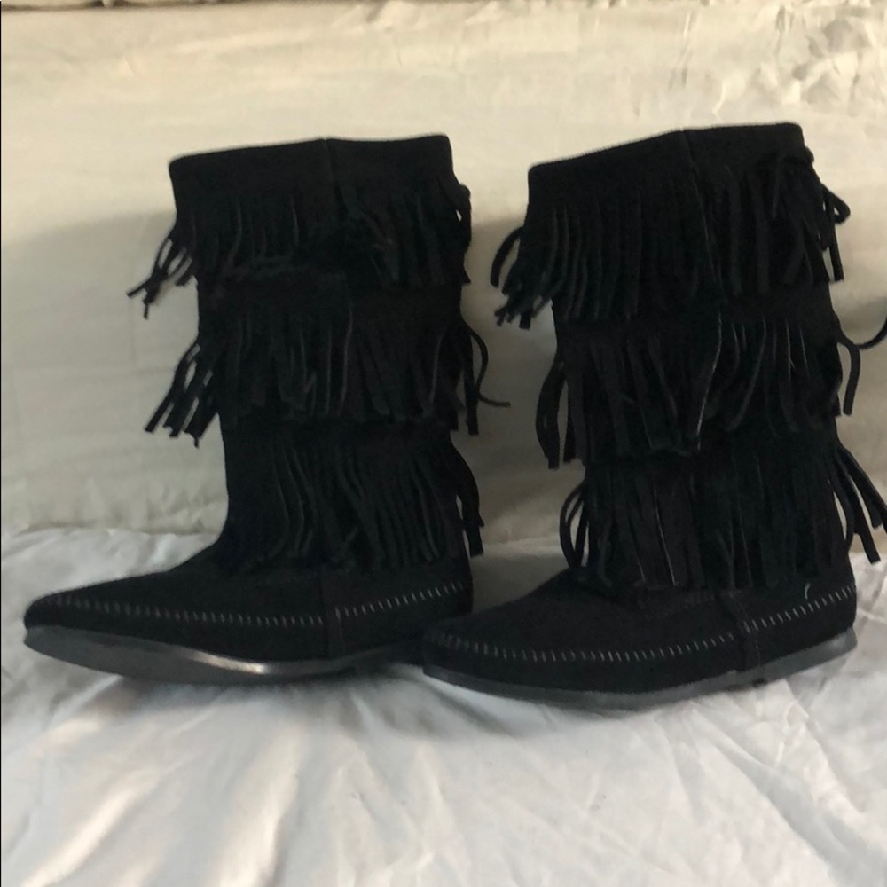 Minnetonka three layer fringe boots.